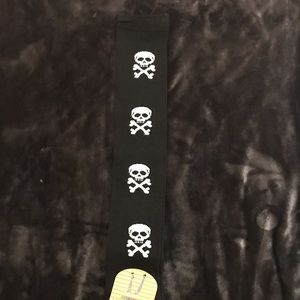 Leg warmers, new in package, skull and crossbones